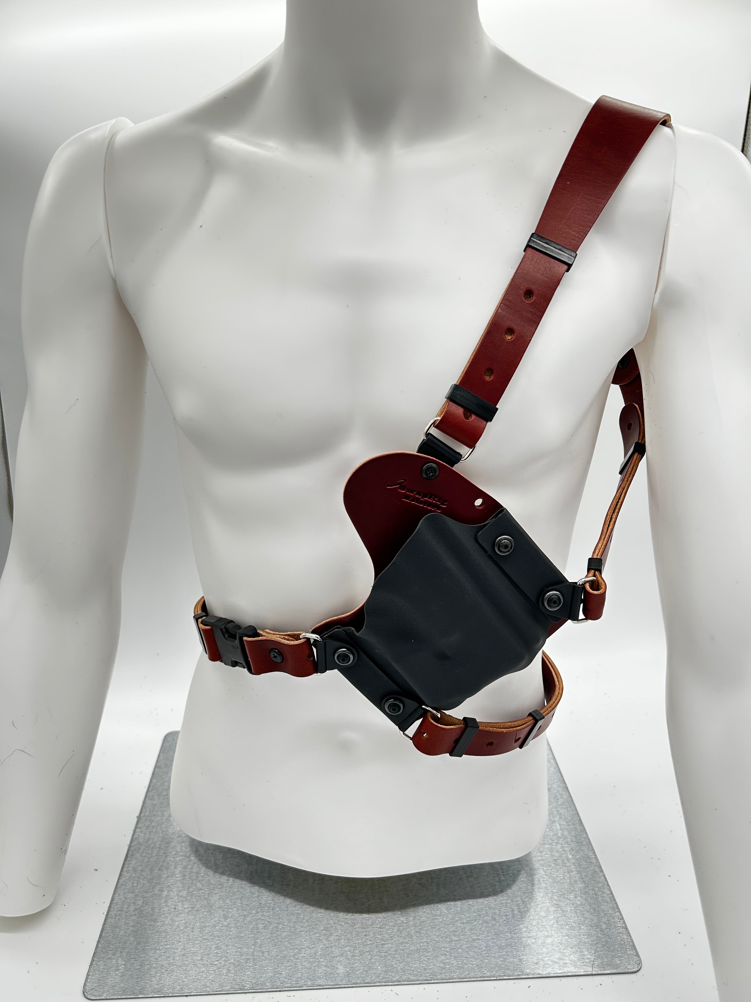 The Outdoorsman Shoulder & Chest Rig Holster is designed to The Outdoorsman Shoulder & Chest Rig Holster is designed to